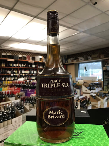 Marie Brizard Peach Triple Sec Liqueur 1 L Type: Liquor Categories: 1L, Liqueur, size_1L, subtype_Liqueur. Buy today at Wine and Liquor Mart Poughkeepsie